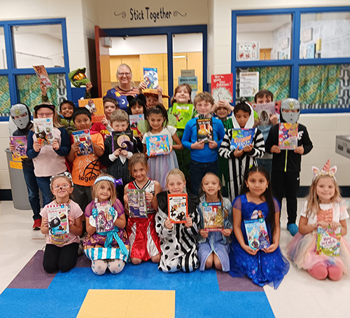 Group of students dressed up as book characters